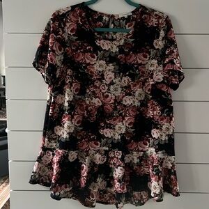 Pleione size medium floral print blouse. Keyhole back button.